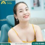 Bọc răng sứ 2 hàm giá bao nhiêu