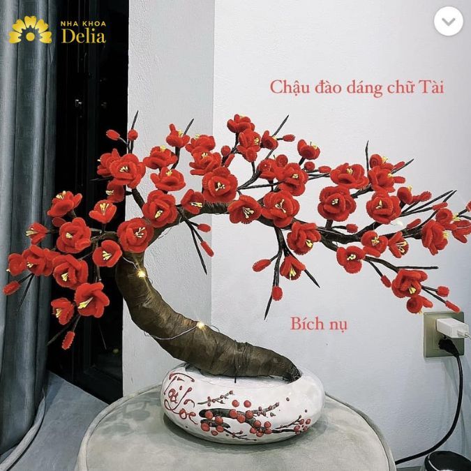 Hoa đào bích nụ dáng chữ Tài làm bằng kẽm nhung