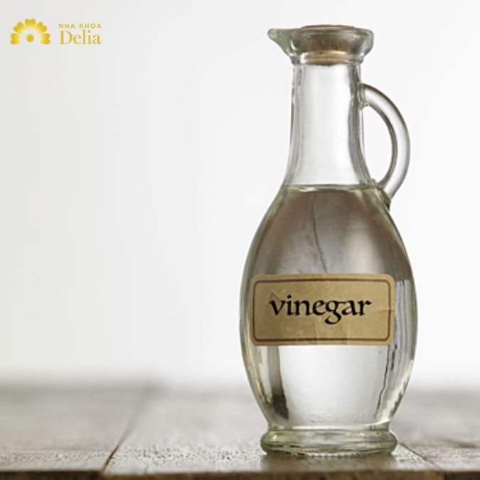Dùng giấm để lấy cao răng tại nhà