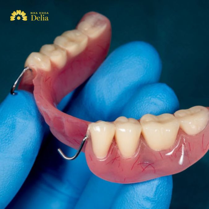 Răng giả bị đau cần điều chỉnh lại răng giả