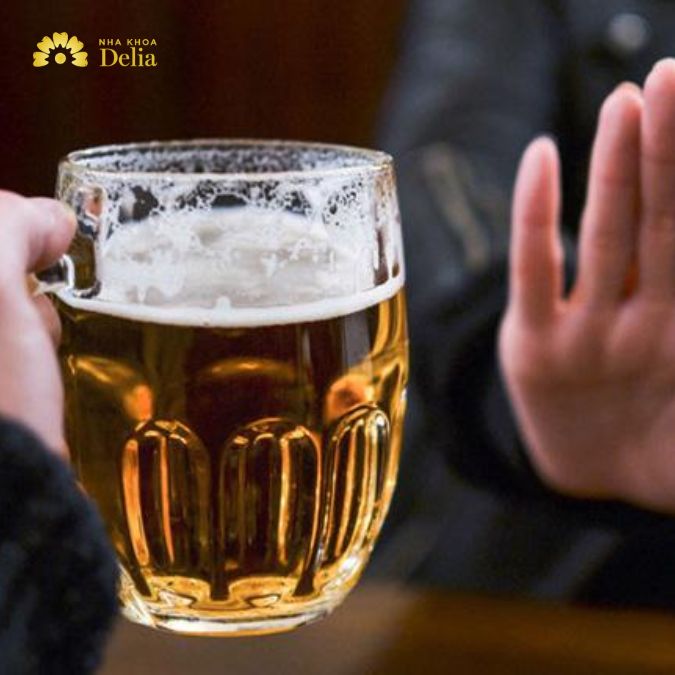 Tránh uống bia rượu thức uống có ga khi đau răng